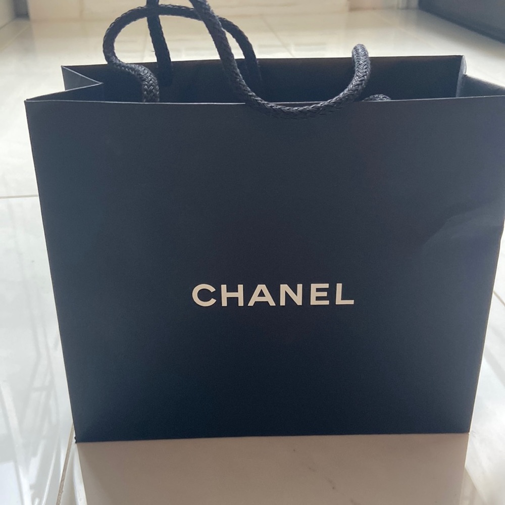 Chanel earrings never worn comes with gift tag